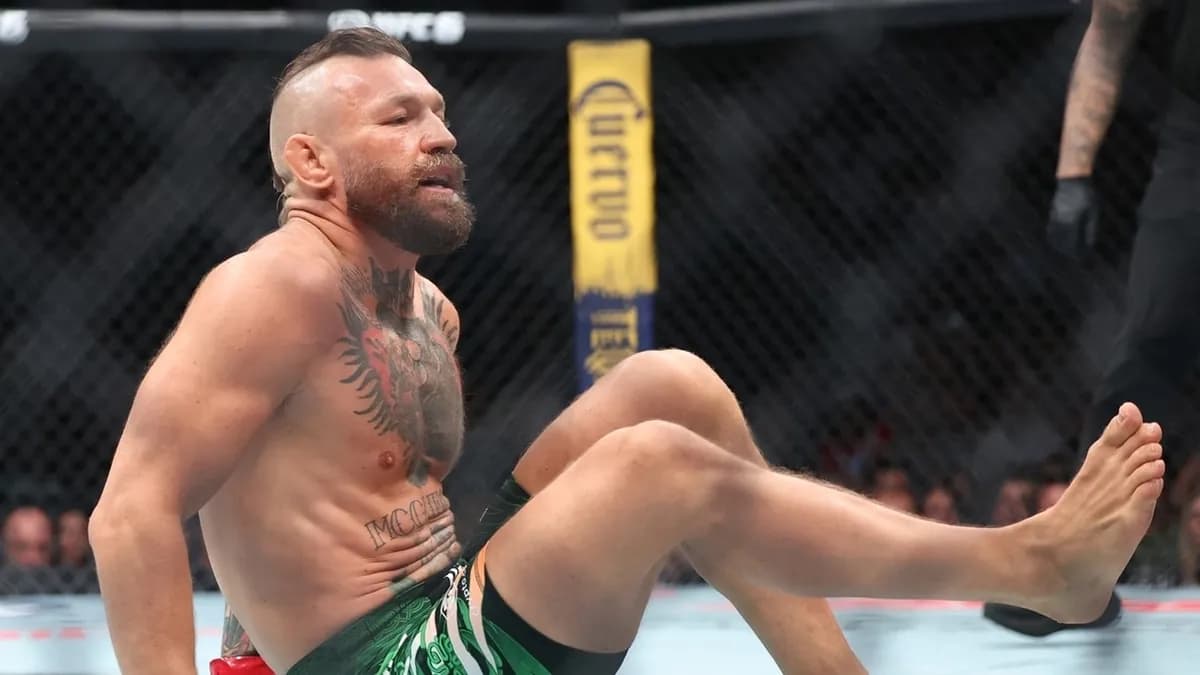 Conor McGregor collapses after a lightning-fast 69-second fight against Max Holloway at UFC 329