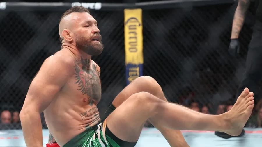 Conor McGregor collapses after a lightning-fast 69-second fight against Max Holloway at UFC 329 Conor McGregor collapses after a lightning-fast 69-second fight against Max Holloway at UFC 329